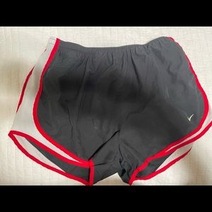 Nike womens shorts. Size large. Red and black.